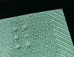 Raised bumps on a Canadian banknote