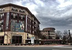 East end of complex and main "Emory Point" sign